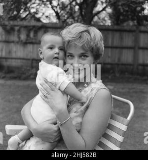 Sylvia Syms, actor and star of Ice Cold In Alex, with her new born baby ...