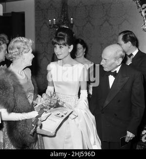 Actress Audrey Hepburn pictured with Earl and Countess Attlee at the London premiere of her latest movie 'Breakfast At Tiffany's' at the Plaza Theatre. 19th October 1961. Stock Photo