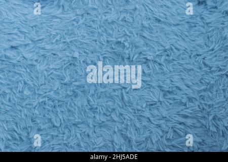 Beautiful sparkling artificial blue fur texture background Stock Photo