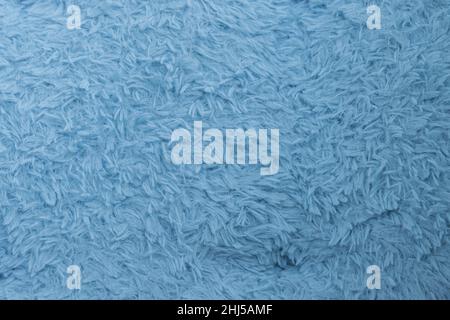Beautiful sparkling artificial blue fur texture background Stock Photo