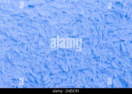 Beautiful sparkling artificial blue fur texture background Stock Photo