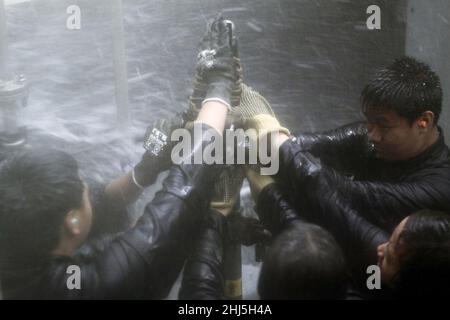 Students from Mira Mesa High School Air Force Junior Reserve Officer Training Corps (JROTC) attempt to patch a pipe while participating in the wet trainer. Stock Photo