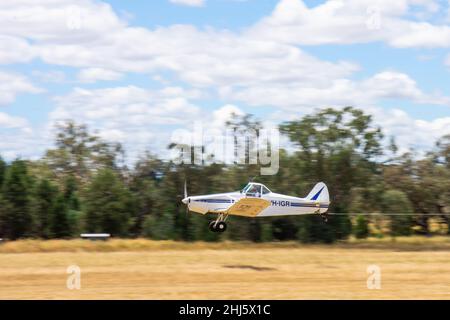 A 1967 Piper PA-25-235 Pawnee airplane just airborne towing a glider at Lake Keepit Soaring Club Gunnedah Australi. Stock Photo