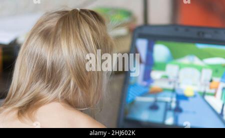 Watch Cartoon Using Computer Watching cartoons on a computer screen, Canada. A popular pastime, in ...