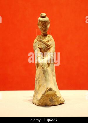 BEIJING, CHINA - JANUARY 26, 2022 - The duichao Terracotta Statue of Women (Northern Wei Dynasty) is on display at the 'Why China' exhibition at the P Stock Photo