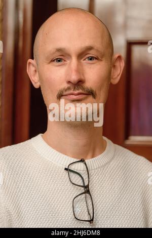Bremen, Germany. 24th Jan, 2022. Matthias Senkel, writer, and winner of the 2022 Bremen Prize for Literature. The Leipzig-based writer was honored for his collection of stories 'Winkel der Welt' (published by Matthes & Seitz Berlin). Credit: Michael Bahlo/dpa/Alamy Live News Stock Photo