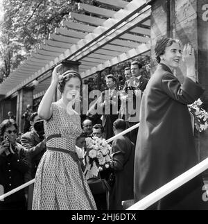 Queen Ingrid (right) and Princess Margrethe photographed during their tour of the Carlsberg Breweries. The Danish royal family are hosting the Queen Elizabeth II and Prince Philip, Duke of Edinburgh visit to Denmark 22nd May 1957. Stock Photo