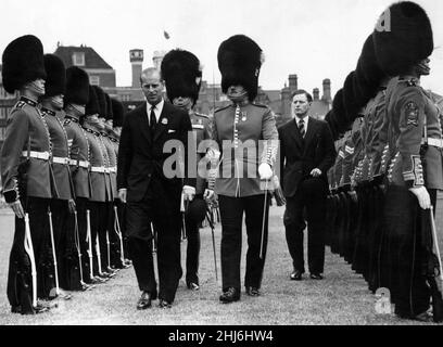 HRH Prince Philip, Duke of Edinburgh inspects the Guard of Honour at the closing ceremony of the Empire Games at Cardiff Arms Park. 1958. Stock Photo