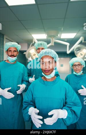 Exhausted surgeons at the emergency room as a sign of stress and overwork Stock Photo