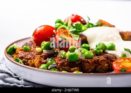 Chickpea pancakes. Vegetarian healthy lunch Stock Photo - Alamy