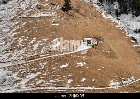 Mountain foot, in dirty road and village house covered by snow at winter. Plateaus in Trabzon during winter season. Stock Photo