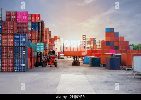 Container forklift in container yard view of transport and industry Stock Photo