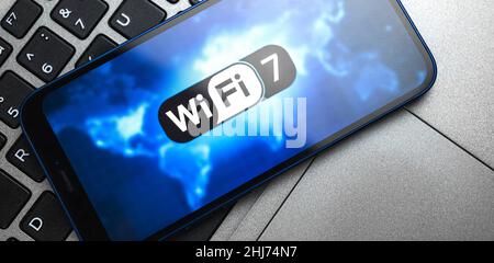 Wi-Fi 7 generation background, icon close-up. Smartphone supporting new Wi-Fi technology for communication, business Stock Photo