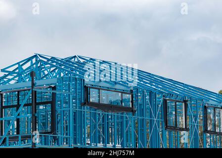 A painted steel framed home or house being constructed in New South Wales, Australia. Housing industry concept. Stock Photo