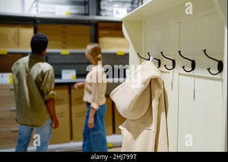 Furniture store showcase with couple on background Stock Photo