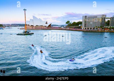 Water-skiers on Sydney Harbour as part of the Australia Day 2022 festivities on Sydney Harbour in Australia. Stock Photo