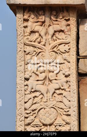 Stupa No 1, West Gateway, Right Pillar outside Face : Carved details of animals and people. World Heritage Site, Sanchi, Madhya Pradesh, India Stock Photo
