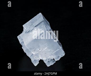 Crystals of potassium chloride on a black background Stock Photo