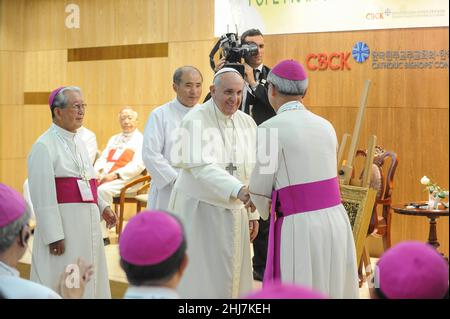 Aug 14, 2014 - Seoul, South Korea : Pope Francis attends the meeting with the bishops of Korea at the headquarters of the Korean Episcopal Conference on August 14, 2014 in Seoul, South Korea. Pope Francis is visiting South Korea from August 14 to August 18. This trip is the third trip abroad for the pope following Brazil and the Middle East. This is the third pontifical visit to South Korea. Stock Photo