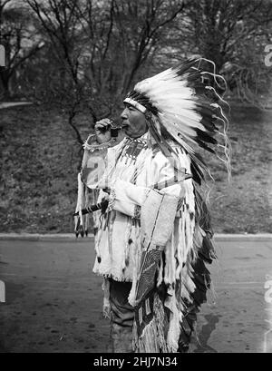 Antique and vintage photo - A pipe smoking Native american / Indian / American Indian. Harris & Ewing, photographer, 1925 Stock Photo