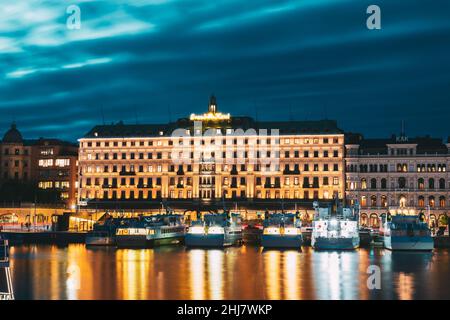 Stockholm, Sweden. Grand Hotel Located On The Peninsula Blasieholmen In Summer Night. Stock Photo