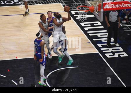 Brooklyn Nets guard James Harden (13) shoot the ball during an NBA basketball game against the LA Clippers, Monday, Dec. 27, 2021, in Los Angeles. The Stock Photo