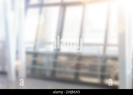 Abstract blurred background. Windows of a large corridor in defocus Stock Photo