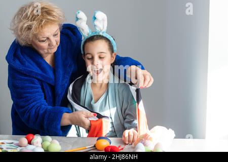 grandmother and granddaughter with uae flag for easter Stock Photo