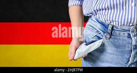 close up of woman showing empty pockets Stock Photo