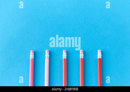 five lead pencils with eraser on tips Stock Photo