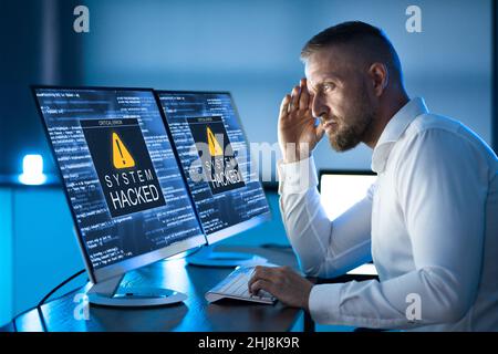 Ransomware Malware Attack And Breach. Business Computer Hacked Stock Photo