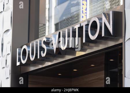 Pedestrians are seen in front of a French luxury fashion brand Louis Vuitton  (LV) store in Hong Kong. (Photo by Budrul Chukrut / SOPA Images/Sipa USA  Stock Photo - Alamy