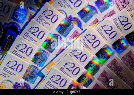 Twenty Pounds Sterling notes showing security hologram printing features. Stock Photo