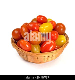 Various mini tomatoes against a white background Stock Photo