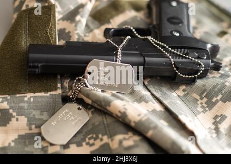 olive special forces uniform aiming whit shotgun. Stock Photo