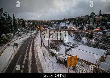 A view towards snowy Jerusalem Old City and Gey Ben Hinnom Park. Jerusalem, Israel. Jan 27th 2022. (Photo by Matan Golan/Sipa USA) Stock Photo