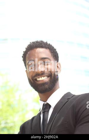Beautiful businessman outside in the summer Stock Photo