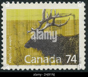 POLTAVA, UKRAINE - January 27, 2022. Vintage stamp printed in Canada circa 1974 shows Wapiti Stock Photo