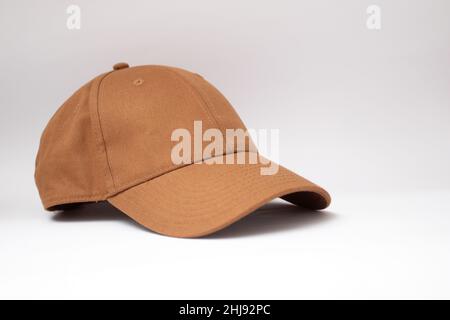 Brown baseball cap on a white background. Stock Photo