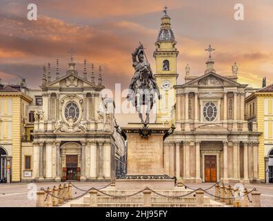 Turin, Piedmont, Italy - April 4, 2016: equestrian monument of Emmanuel Philibert in Piazza San Carlo, St. Charles square, and twins churches Santa Cr Stock Photo