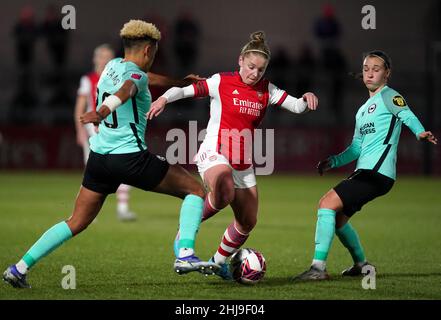 Arsenal's Kim Little (centre) in action with Brighton and Hove Albion's Victoria Williams (left) and Julia Olme during the Barclays FA Women's Super League match at Meadow Park, London. Picture date: Thursday January 27, 2022. Stock Photo