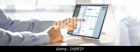 Online Digital E Invoice Statement On Laptop Stock Photo