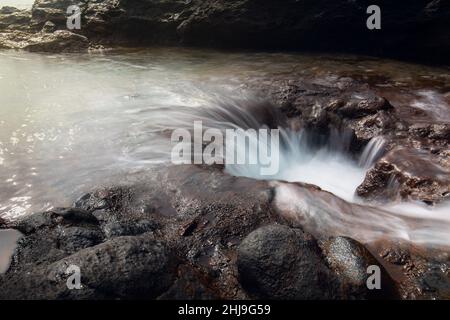 Long exposure of lava rock pools on tenerife Stock Photo