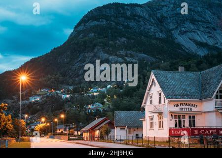 Eidfjord, Hordaland County, Hardanger Region, Hardangerfjord, Norway. Old Wooden House In Norwegian Countryside In Summer Night. Stock Photo