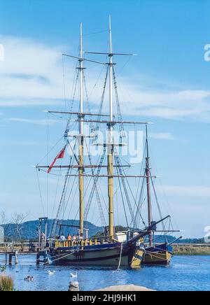 The image is of the replica theme park  of Old Sydney Town as it was in the 17th century being a popular tourist attraction, with this image showing the tall coastal merchant ships Stock Photo