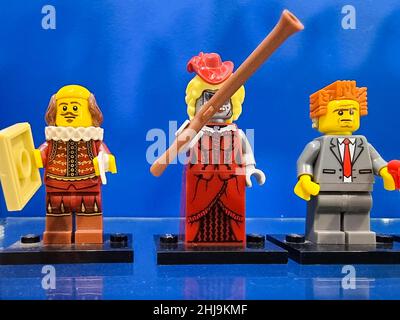 Minsk, Belarus - April 22, 2021 Lego constructor. Three human minifigures. The exhibits are made of Lego bricks. Stock Photo