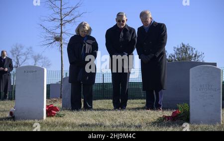 Arlington, United States. 27th Jan, 2022. NASA Deputy Administrator Pam Melroy, left, NASA Administrator Bill Nelson, and NASA Associate Administrator Bob Cabana, right, pay respects at the grave markers of Virgil 'Gus' Grissom and Roger Chaffee, from Apollo 1, during a ceremony that was part of NASA's Day of Remembrance Thursday, Jan. 27, 2022, at Arlington National Cemetery in Arlington, Virginia. Wreaths were laid in memory of those men and women who lost their lives in the quest for space exploration. NASA Photo by Bill Ingalls/UPI Credit: UPI/Alamy Live News