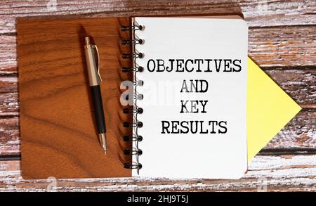 Objective Key Results OKR text in the office notebook. View from above. Stock Photo
