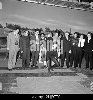 Gillian Lynne, the choreographer for the film 'Wonderful Life' leads the whole company in some dance routines. L-R Peter Myers, Ronnie Cass, Sidney Furie, Susan Hampshire, Cliff Richard, Ken Harper, Hank Marvin, Brian Bennett and Bruce Welch. 6th November 1963. Stock Photo