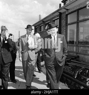 1963 Great Train Robbery was the robbery of ¿2.6 million from a Royal Mail train heading from Glasgow to London on the West Coast Main Line in the early hours of 8th August 1963, at Bridego Railway Bridge, Ledburn, near Mentmore in Buckinghamshire, England. Our Picture Shows ... Detective Superintendent Gerald McArthur of Scotland Yard (front, wearing hat) arrives on scene to examine the mail carriage in the sidings at Cheddington Train Station, Friday 9th August 1963. Stock Photo